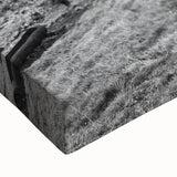 Close-up of a stretched canvas wall art featuring a vibrant countryside landscape design, showcasing lush green fields, rolling hills, and a serene blue sky, perfect for home decor.