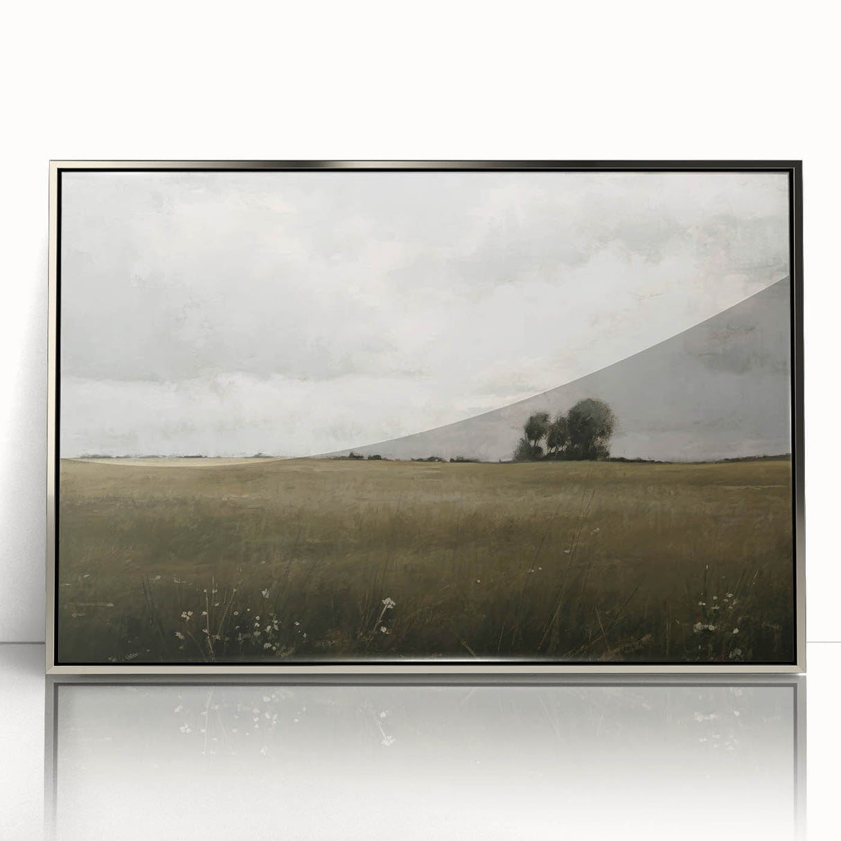 Framed wall art showcasing a serene countryside landscape with vibrant greens and a tranquil sky, elegantly displayed in a sleek silver frame, ideal for home decor.