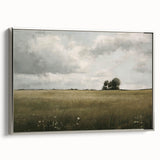 Framed canvas wall art showcasing a serene countryside landscape design with silver accents, perfect for home decor. The artwork captures vibrant colors and lush scenery, adding a touch of nature to any interior space.