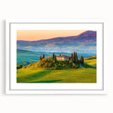 Framed wall art featuring a serene countryside landscape design with vibrant greens and blues, presented in a white mat frame, ideal for home decor.