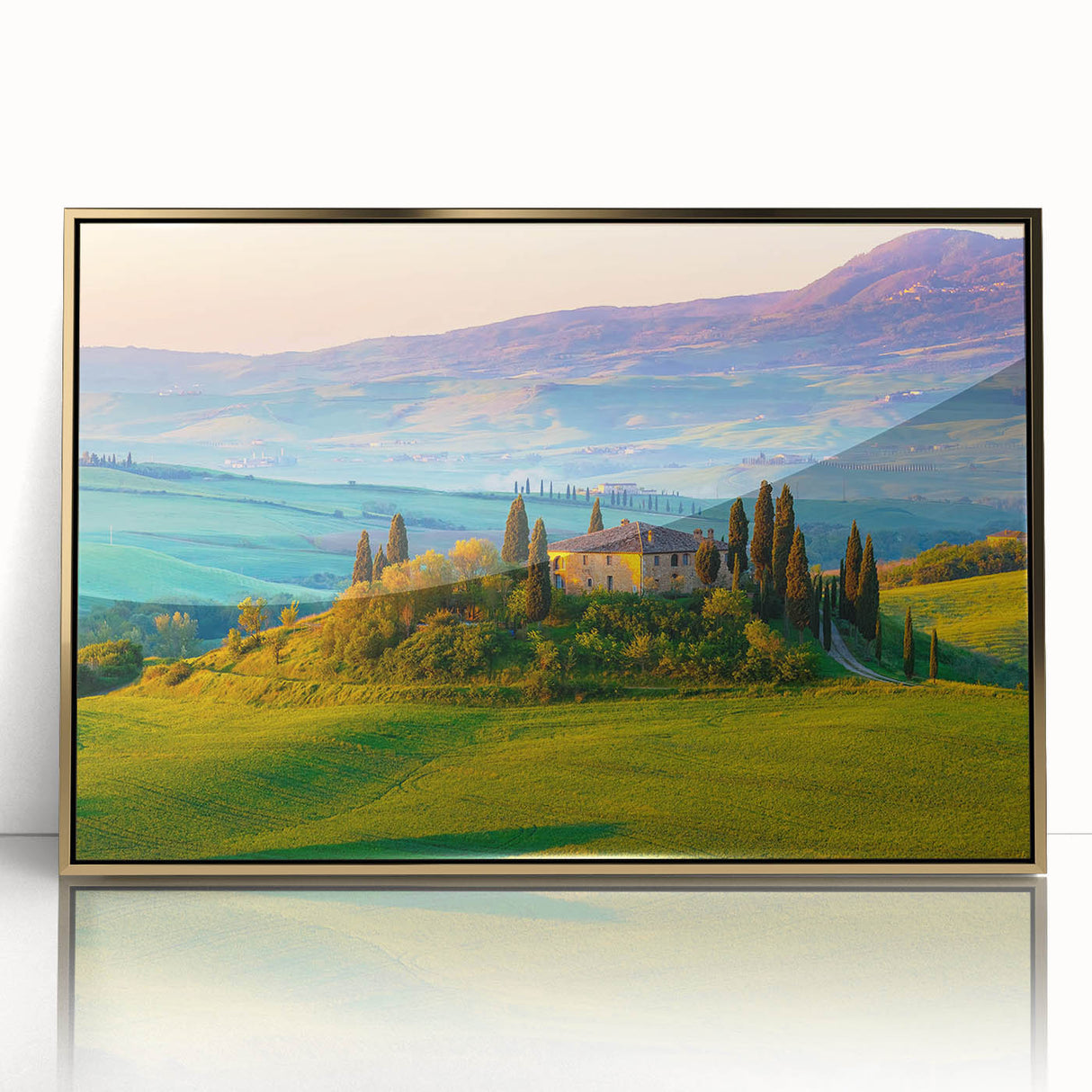 Framed acrylic wall art depicting a serene countryside landscape in golden hues, featuring lush rolling hills and vibrant greenery, ideal for home decor.