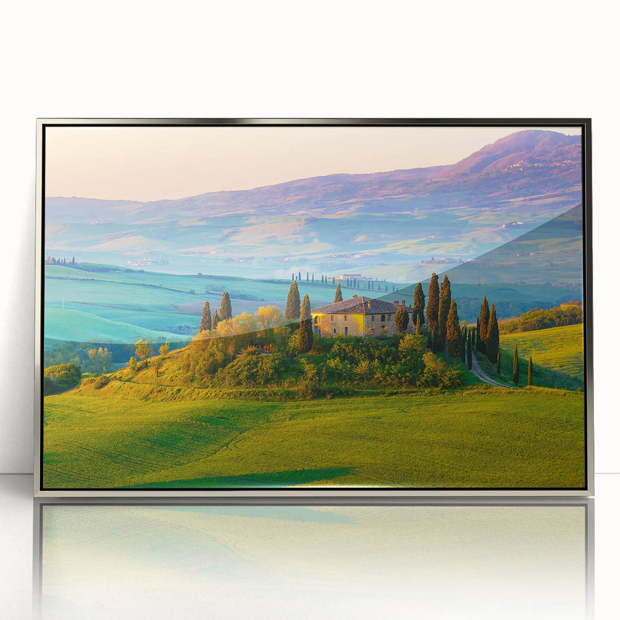 Framed acrylic wall art featuring a serene countryside landscape with vibrant green fields and a clear blue sky, designed to enhance home decor.