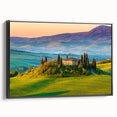 Framed canvas wall art showcasing a serene countryside landscape design, featuring vibrant greens and soft blues, with a sleek black frame enhancing its elegance. Perfect for home decor and nature enthusiasts.