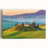 Stretched canvas wall art featuring a serene countryside landscape with rolling hills, vibrant greenery, and a clear blue sky, ideal for home decor.