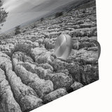 Close-up of an acrylic glass wall art piece showcasing a serene countryside landscape, rich in vibrant greens and soft blues, ideal for home decor enhancement.