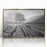 Framed acrylic wall art featuring a serene countryside landscape with vibrant greens and golden hues, showcasing rolling hills and a tranquil atmosphere, perfect for home decor.