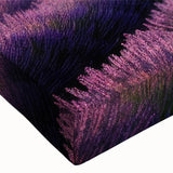 Close-up view of a stretched canvas wall art piece showcasing a vibrant countryside landscape design, featuring lush greenery, rolling hills, and a serene sky, perfect for home decor.