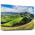 Acrylic glass wall art featuring a vibrant countryside landscape design, showcasing lush green fields and a bright blue sky, elegantly displayed from a side view with decorative pins.
