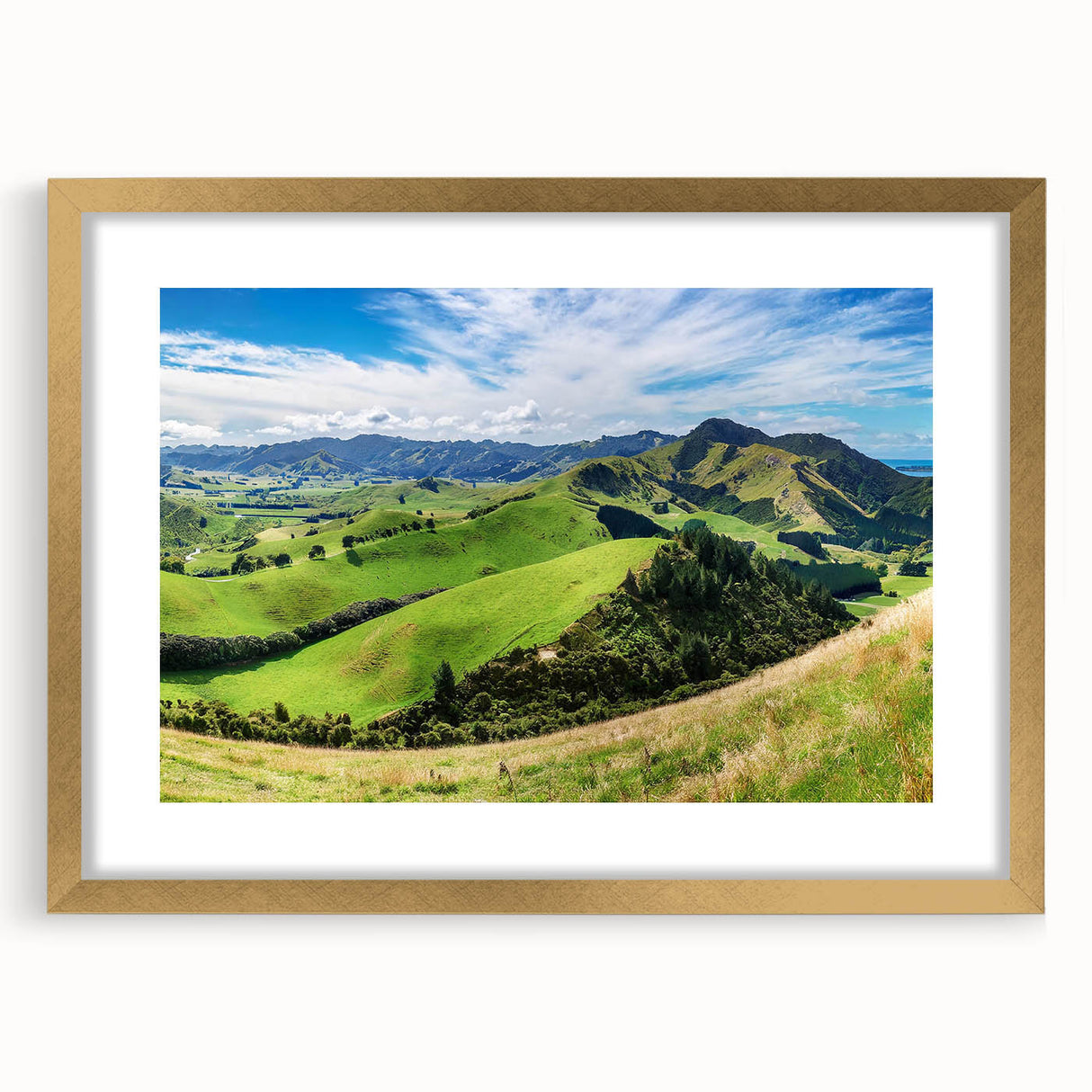Elegant gold-framed wall art showcasing a serene countryside landscape design, complete with a mat, perfect for enhancing home decor and adding a touch of nature.