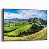 Framed wall art featuring a serene countryside landscape design with vibrant colors, showcasing rolling hills and a sunset backdrop, perfect for home decor.