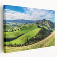 Stretched canvas wall art showcasing a serene countryside landscape with vibrant greens and blues, perfect for home decor or office settings.