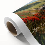 Rolled canvas artwork showcasing a vibrant countryside landscape design, featuring lush greenery and a serene sky, elegantly packaged in a protective cardboard tube for easy display.