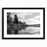Framed wall art collection of serene countryside landscapes, featuring a black frame and mat, perfect for enhancing home decor with a rustic touch.