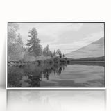 Framed wall art featuring a serene countryside landscape with vibrant green fields and a clear blue sky, designed to enhance home decor and evoke tranquility.