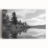 Stretched canvas wall art showcasing a serene countryside landscape with vibrant green fields and a clear blue sky, perfect for home decor.