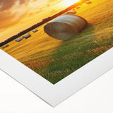 Rolled canvas artwork showcasing a serene countryside landscape with vibrant green fields and a blue sky, ideal for home decor and nature-inspired themes.