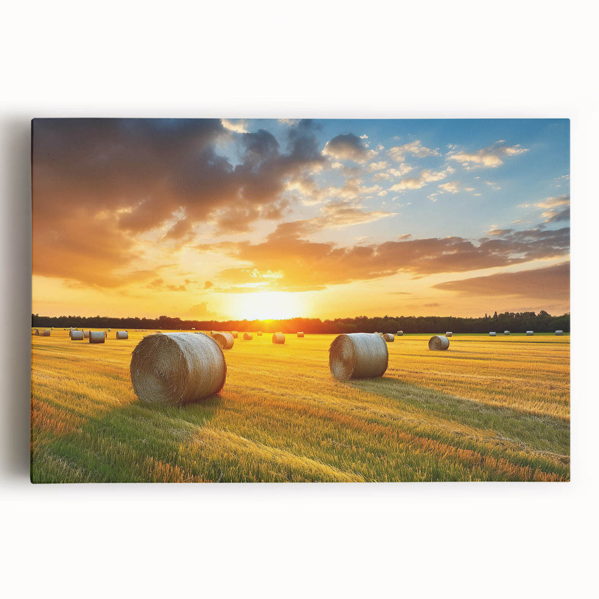 Stretched canvas wall art depicting a serene countryside landscape with vibrant green fields and a clear blue sky, ideal for home decor and relaxation.
