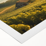 Rolled canvas print showcasing a vibrant landscape of rolling hills and a serene countryside scene, designed to enhance home decor with its rich colors and tranquil atmosphere.