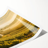 Rolled print showcasing a vibrant countryside landscape design with rolling hills and a serene sky, perfect for home decor or art collection. The artwork is elegantly packaged in a protective tube to ensure safe delivery.