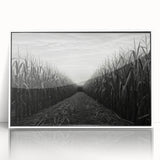 Framed acrylic wall art showcasing a serene countryside landscape with lush greenery and rolling hills, displayed in a white frame for a modern touch.