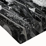 Close-up of a stretched canvas print showcasing a vibrant countryside landscape design, featuring lush green fields and a serene sky, perfect for home decor.