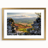 Framed wall art showcasing a breathtaking countryside landscape with vibrant colors, featuring a gold mat and elegant frame, ideal for enhancing home decor.