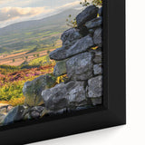 Framed canvas wall art showcasing a serene countryside landscape with vibrant green fields and a clear blue sky, perfect for home decor enthusiasts.