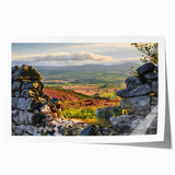 Scenic countryside landscape wall art print featuring vibrant green fields, rolling hills, and a serene blue sky, rolled for easy shipping and display. Ideal for home decor enthusiasts seeking nature-inspired art.