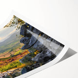 Rolling hills of a vibrant countryside landscape depicted in a colorful wall art print, showcasing a serene atmosphere with lush greenery and a clear blue sky, perfect for home decor.