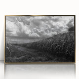 Framed wall art showcasing a serene countryside landscape design, featuring lush green fields and a tranquil sky, with a stylish gold frame enhancing its elegance.