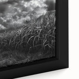 Framed canvas wall art showcasing a vibrant countryside landscape with lush green fields and a serene blue sky, perfect for home decor enthusiasts.
