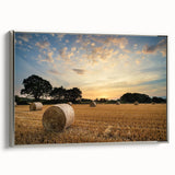 Framed canvas wall art featuring a tranquil countryside landscape design with a silver frame, offering a peaceful aesthetic for home decor. Ideal for enhancing living spaces with natural beauty.