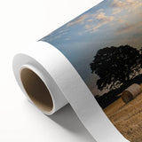 Rolled canvas artwork showcasing a vibrant countryside landscape design, featuring lush green fields and a serene blue sky, ideal for home decor.