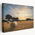 Stretched canvas artwork depicting a serene countryside landscape with lush greenery, vibrant flowers, and a tranquil atmosphere, perfect for home decor.