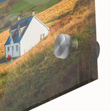 Close-up of a vibrant acrylic glass wall art piece showcasing a serene countryside landscape with rolling hills, lush greenery, and a clear blue sky, perfect for home decor.