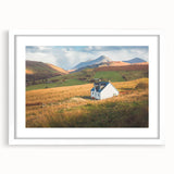 Framed white mat wall art collection showcasing serene countryside landscapes, emphasizing vibrant colors and intricate details in a stylish modern frame.