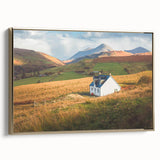 Framed canvas wall art collection showcasing a serene countryside landscape with vibrant green fields and rolling hills, accented by a gold frame, perfect for home decor.