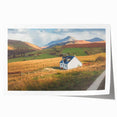 Rolled print showcasing a serene countryside landscape design with vibrant colors, ideal for home decor, shipped securely in a protective cardboard tube.