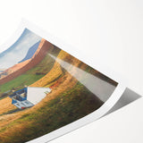 Rolling countryside landscape wall art print showcasing vibrant green fields and a serene blue sky, perfect for home decor and enhancing interior aesthetics.