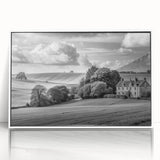 Framed wall art collection showcasing a serene countryside landscape design, featuring vibrant green fields and a clear blue sky, with a sleek white frame enhancing its elegance. Perfect for home decor.