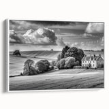 Framed canvas wall art showcasing a serene countryside landscape design, featuring lush green fields, a vibrant blue sky, and warm earthy tones, ideal for home decor.