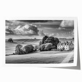 Rolled print of a serene countryside landscape featuring lush green hills, a tranquil river, and a vibrant sunset, ideal for home decor and nature enthusiasts.