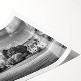 Rolled print of a serene countryside landscape featuring vibrant green fields, rolling hills, and a clear blue sky, ideal for home decor and wall art.