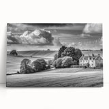Stretched canvas wall art collection showcasing a serene countryside landscape, featuring lush green fields and a clear blue sky, ideal for home decor.