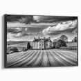 Framed canvas wall art featuring a serene countryside landscape with vibrant greens and blues, showcasing a black frame from a side view, ideal for home decor.