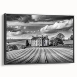 Framed canvas wall art featuring a serene countryside landscape with vibrant greens and blues, showcasing a black frame from a side view, ideal for home decor.