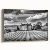 Framed canvas wall art featuring a serene countryside landscape with vibrant greens and a tranquil blue sky, elegantly displayed with a gold frame for a luxurious touch. Perfect for home decor enthusiasts seeking nature-inspired designs.