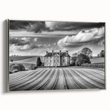 Framed wall art showcasing a serene countryside landscape with vibrant greens and blues, accented by a sleek silver frame, ideal for home decor.