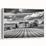 Framed canvas wall art showcasing a serene countryside landscape design with lush green fields and a bright blue sky, perfect for home decor.