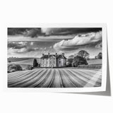 Vibrant rolled print showcasing a serene countryside landscape with rolling hills and a clear blue sky, ideal for home decor and wall art collection.